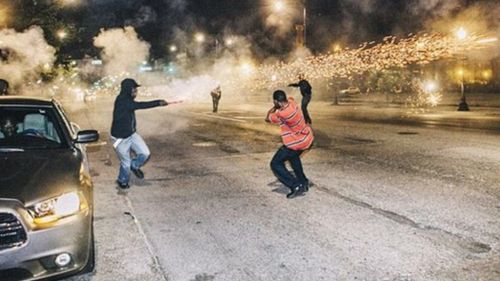 The group fired Roman Candle fireworks from close range at each other. (Instagram/Lenny Gilmore)