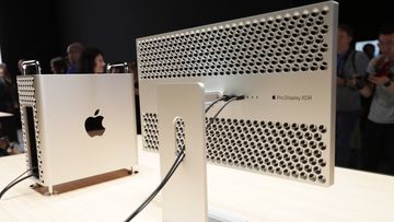 Journalists photograph the new Apple Mac Pro at the end of the keynote address at the Apple World Wide Developers Conference at the McEnery Convention Center in San Jose, California, USA