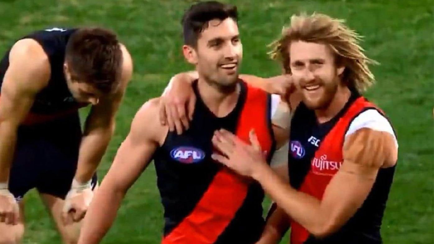 Essendon captain Dyson Heppell under fire for post-game laugh with teammate
