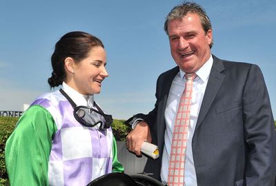Michelle Payne poses with trainer Darren Weir after the win of Prince of Penzance.  (Getty)