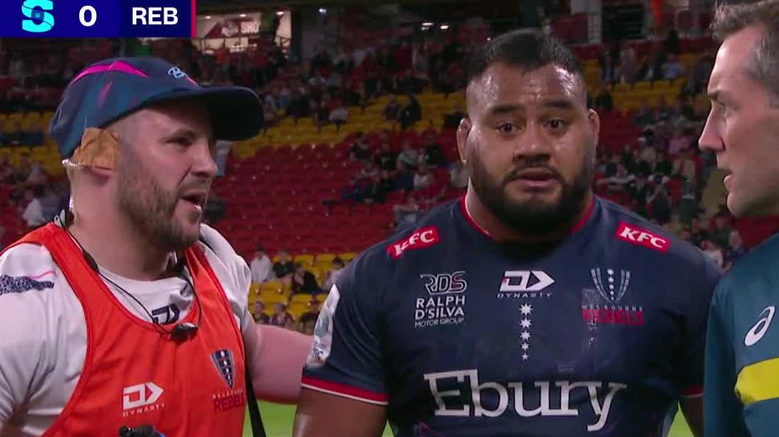 Rebels prop Taniela Tupou leaves the field after copping a hit to the head in the round 12 match against the Reds.