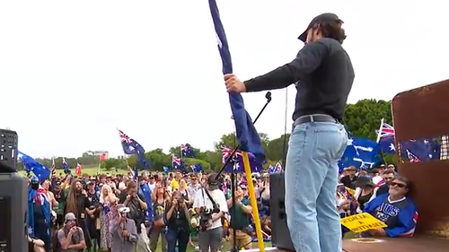 Brandan Koschel, 31, is accused of breaching newly passed racial hatred incitement laws in remarks to thousands of attendees of the anti-immigration March for Australia rally in Sydney yesterday.