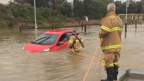 A woman had to be rescued from her car in Altona Meadows.