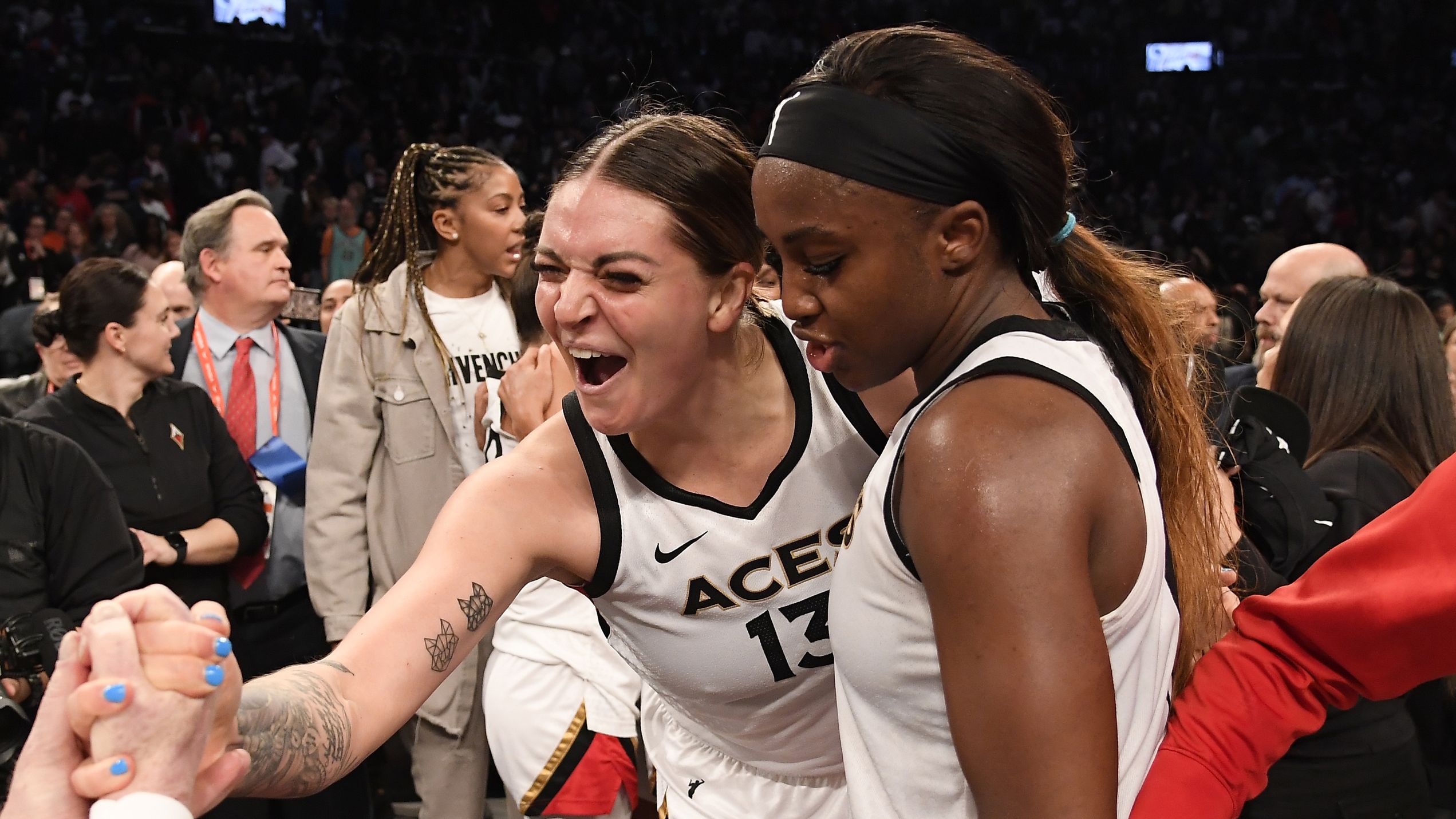 Cayla George #13 of the Las Vegas Aces celebrates after winning the WNBA Final against the New York Liberty during Game 4 of the 2023 WNBA Finals on October 18, 2023 at Barclays Center in Brooklyn, New York.  (Photo by Brian Babineau/NB)