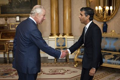 King Charles III welcomes Rishi Sunak during an audience at Buckingham Palace, London, where he invited the newly elected leader of the Conservative Party to become Prime Minister and form a new government, Tuesday, Oct. 25, 2022.