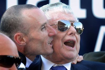 ...and copping a kiss from Glenn Boss after winning the 2009 Cox plate.