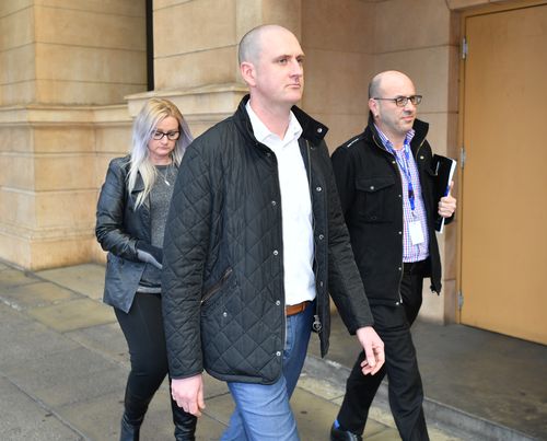 The husband of Lucy Paveley, Jaime (centre) and Cindy Juel-Chapman (left) are seen outside the District Court in Adelaide.