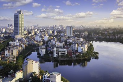 View over the city of Hanoi, Vietnam, with Trúc Bch Lake in the foreground.