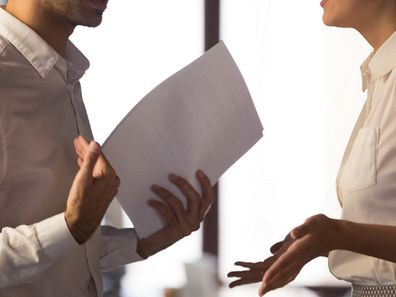 Work meeting attended by men and women