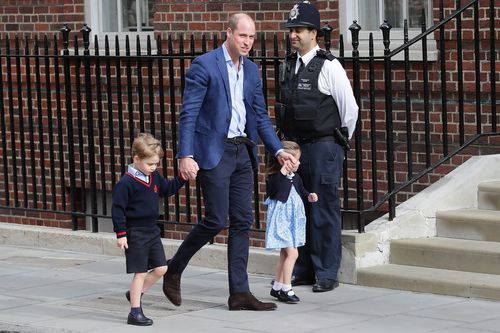 Prince William walks George and Charlotte into the hospital to meet their baby brother. (AAP)