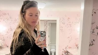 Pregnant model Behati Prinsloo shows off baby bump.