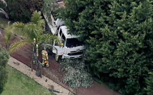 A truck carrying an excavator crashed into a pedestrian in Donvale. 