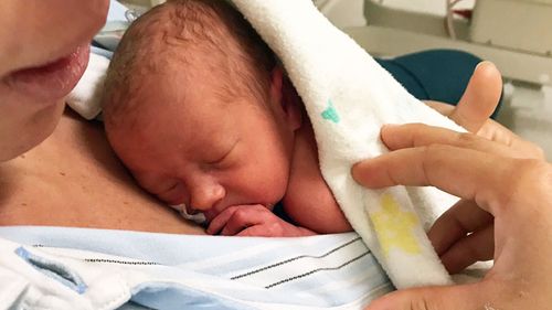 Gold Coast baby born encased in her amniotic sac
