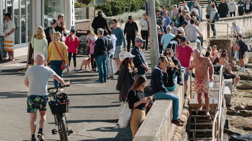 Crowds flock to enjoy the sunshine in Manly, Sydney over the weekend, despite the city being plunged into lockdown.