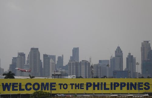 Heavy cloud fills the sky above Manila, which is in the north of the Philippines - the area likely to be worst affected.