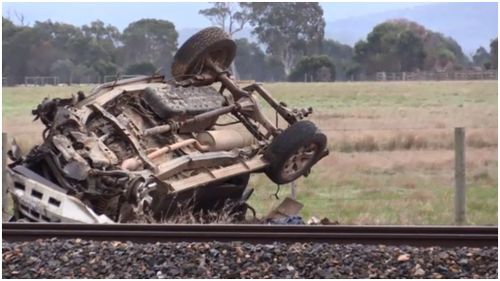 Man dies after car collided with train at Victorian crossing