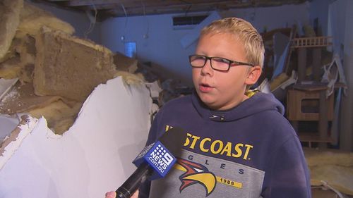 Thirteen-year-old Dominic Vaughn and his dad were watching TV at 9pm on Tuesday when they heard the roof crack at their Joondalup home.