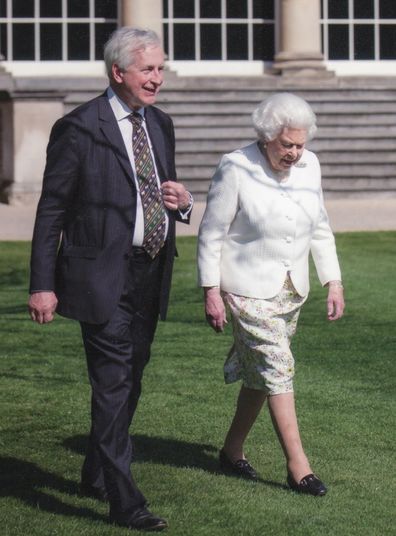 Hugo Vickers with Her Majesty, The Queen at a Buckingham Palace garden in 2018 