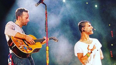 Emmanuel Kelly performs with Chris Martin at Coldplay's Melbourne concert in 2016