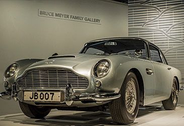 What model Aston Martin does James Bond drive in Goldfinger?