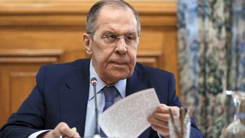 Russian Foreign Minister Sergey Lavrov speaks during a meeting with top envoys from the separatist regions in eastern Ukraine, Vladislav Deinego of the Luhansk People's Republic and Sergei Peresada, of the Donetsk People's Republic (DPR), in Moscow, Russia, Friday, Feb. 25, 2022