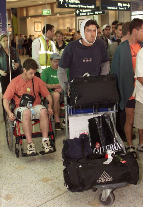 Bali bombing survivors transfer to internal flights at Sydney International Airport, 24 hours after the blast