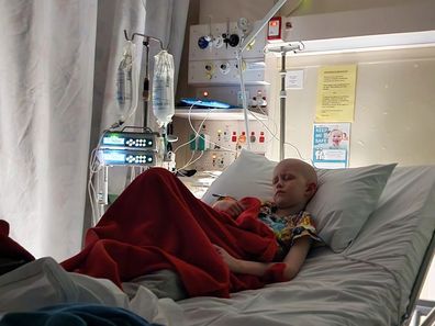 Ollie Jepson in hospital during cancer treatment.