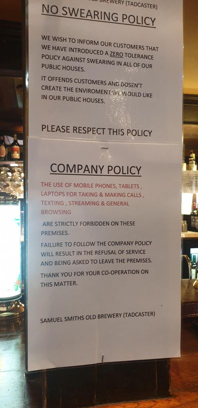Pub bans swearing and use of mobile phones in strongly-worded 'company policy'.