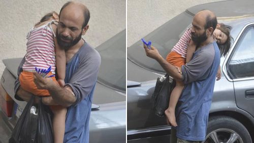 The touching photo of a Syrian refugee and his daughter that will change their lives forever