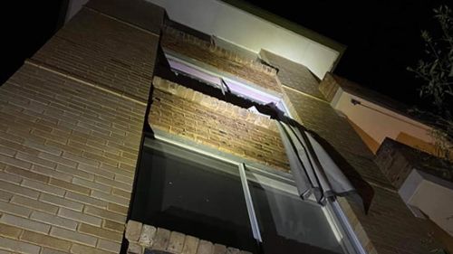 The windows of a unit were blown out by an explosion caused by bug spray.