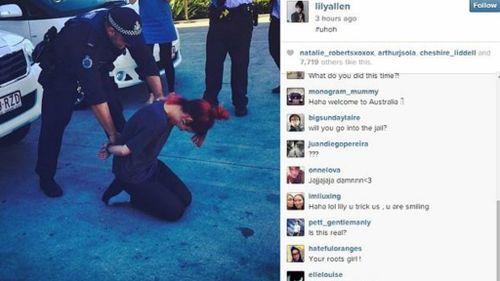 Lily Allen posted a photo on Twitter of her apparently being 'cuffed' by AFP officers on the Gold Coast.