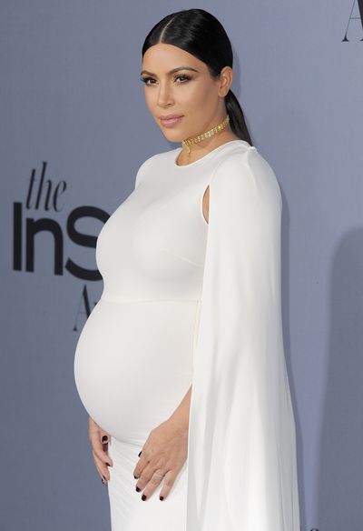Kim Kardashian - opts for head to toe white.