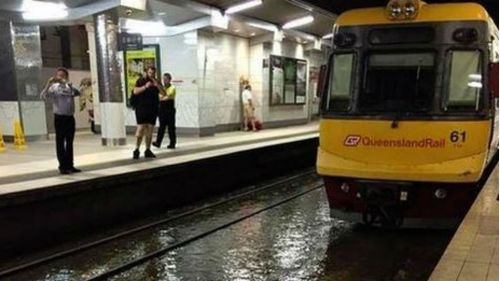 Queensland Rail has suspended services after several stations flooded. (South-east Queensland Emergency Team)