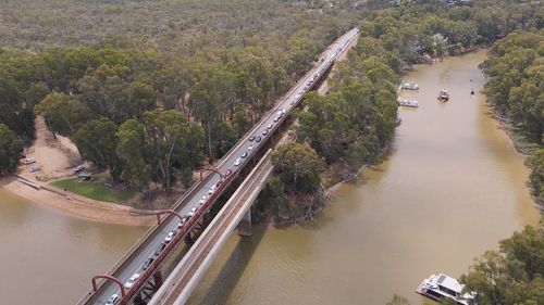 The midnight border closure forced thousands of holiday-makers to rush back to Victoria.