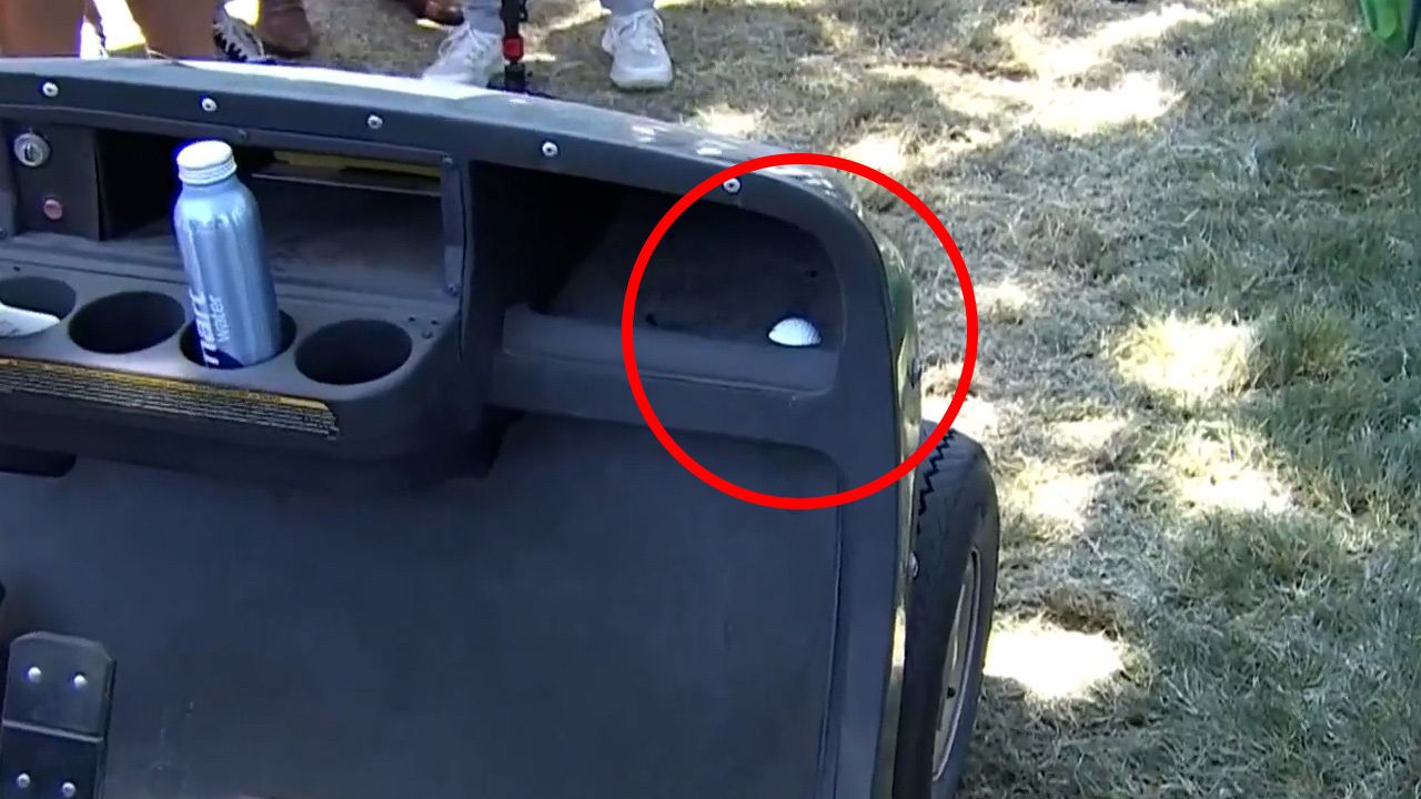 The ball of Cameron Young in the ball holder of a cart after a wayward tee shot at the US Open.