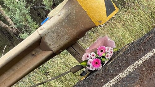 Dubbo police officers lay flowers after girl killed on the way to Taylor Swift concert.