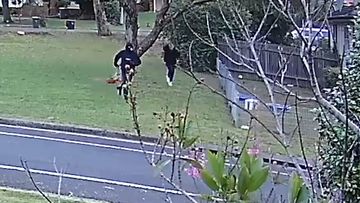 CCTV captures two men running through Colechin Reserve at Yagoona just after Mr Hamzy&#x27;s murder. As one of the men flees, his hood falls from his head revealing his face and distinctive blond hair. The two men then leave the area in two luxury cars.