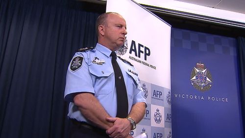 AFP Assistant Commissioner Neil Gaughan at today's joint press conference. (9News)