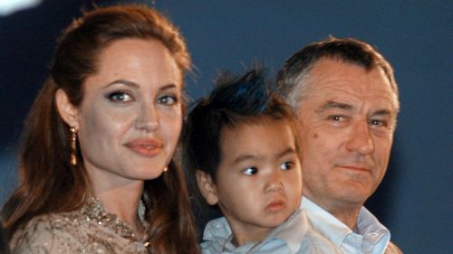 Angelina Jolie, son Maddox and Robert De Niro at the premiere of 2004 animated film Shark Tale, in which Grimshaw voiced an Australian character. (AAP)