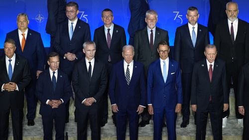 NATO leaders pose during a group photo