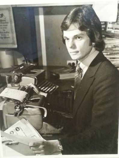 Young Penfold at his desk