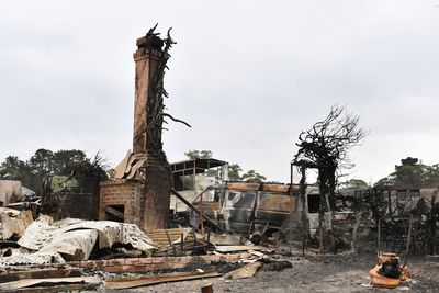 The burnt out remains of a house is seen from a bushfire in the Southern Highlands town of Wingello, 160km south west of Sydney, Monday, January 6, 2020