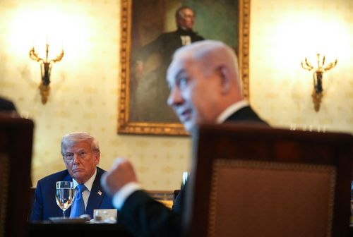 WASHINGTON, DC - JULY 07: U.S. President Donald Trump looks on as Israeli Prime Minister Benjamin Netanyahu speaks during a dinner in the Blue Room of the White House on July 07, 2025 in Washington, DC. Trump is hosting Netanyahu for a dinner as the two discuss a potential ceasefire agreement to end the fighting in Gaza. (Photo by Andrew Harnik/Getty Images)