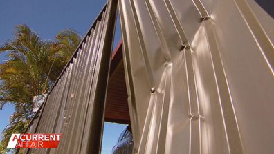 Queensland pensioner Kevin Brummell's damaged fence.