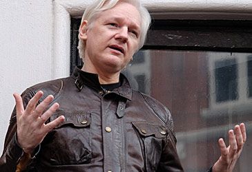 How many children did Julian Assange father while in London's Ecuadorian embassy?
