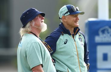 Joe Schmidt and Laurie Fisher talk during a Wallabies training session at Ballymore Stadium.