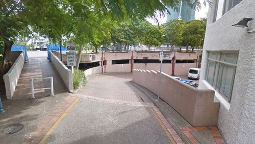 Eyewitnesses on the Gold Coast shared photos on social media of tanks from the Explosive Ordinance Response Team, or bomb squad, arriving at the Bruce Bishop car park, where it's understood the man detained at Brisbane Airport has his car parked.