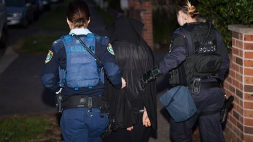 A total of 15 men were arrested in the Sydney raids. (AAP)