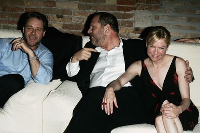 Actor Russell Crowe, producer Harvey Weinstein and actress Renee Zellweger attend the after party for 'Cinderella Man' on the sixth day of the 62nd Venice Film Festival, in 2005.