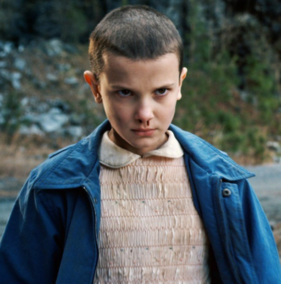 A young Millie Bobby Brown in Stranger Things. She landed the role when she was just 11, and started acting when she was 9.